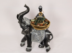 30CM AFRICAN LADY ON ELEPHANT HOLDING GOLD BOWL